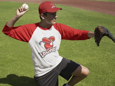 Teen Boy Playinig as Catcher Outdoors